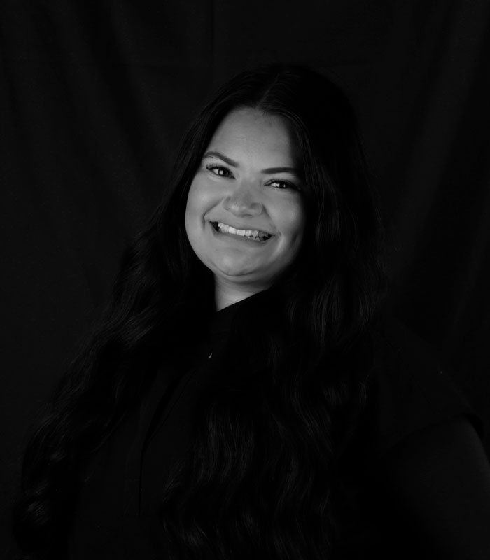 Daisy, Hygienist Black and white profile image of Daisy, a Hygienist at Urbana & Darby Dental Smiles.
