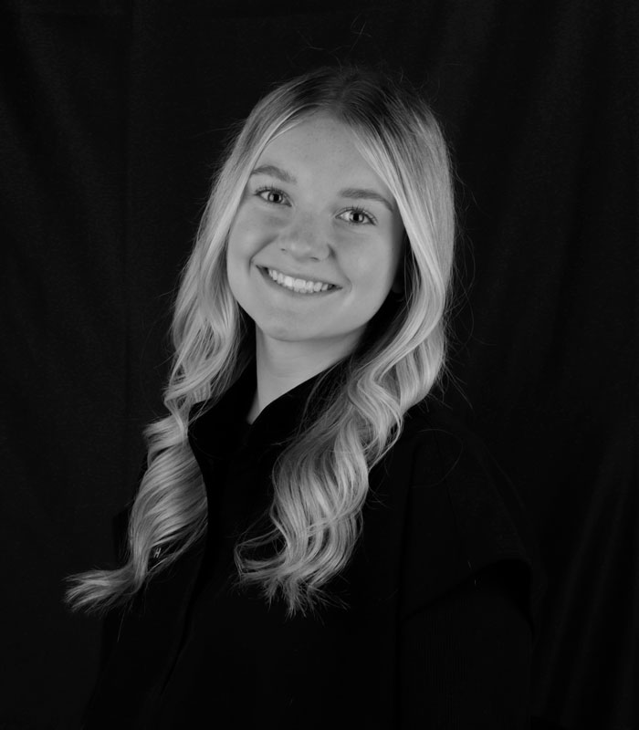 Chloe, Hygienist Black and white profile image of Chloe, a Hygienist at Urbana & Darby Dental Smiles.