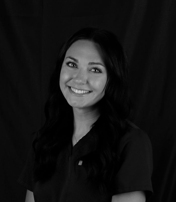 Emily, Assistant Black and white profile image of Emily, an Assistant at Urbana & Darby Dental Smiles.